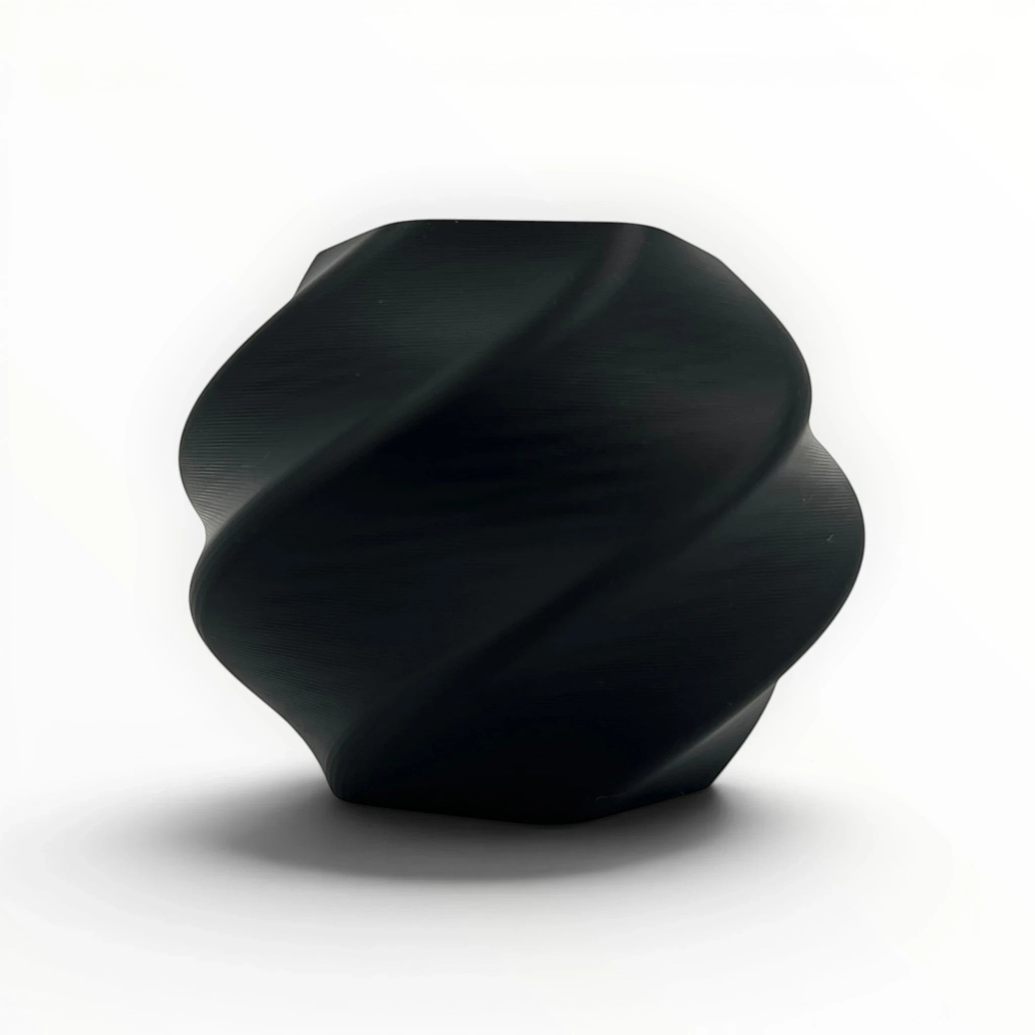 Templast black PLA Pro filament, 1.75mm diameter, with a twisted, sculptural design. Ideal for 3D printing.