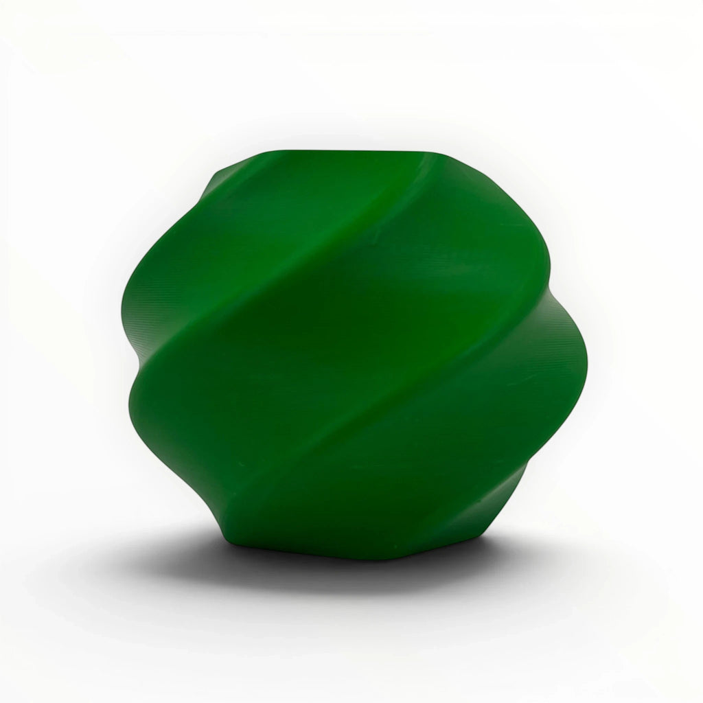 Templast professional PETG filament in a vibrant green hue, featuring a unique twisted design. Ideal for 3D printing functional parts.