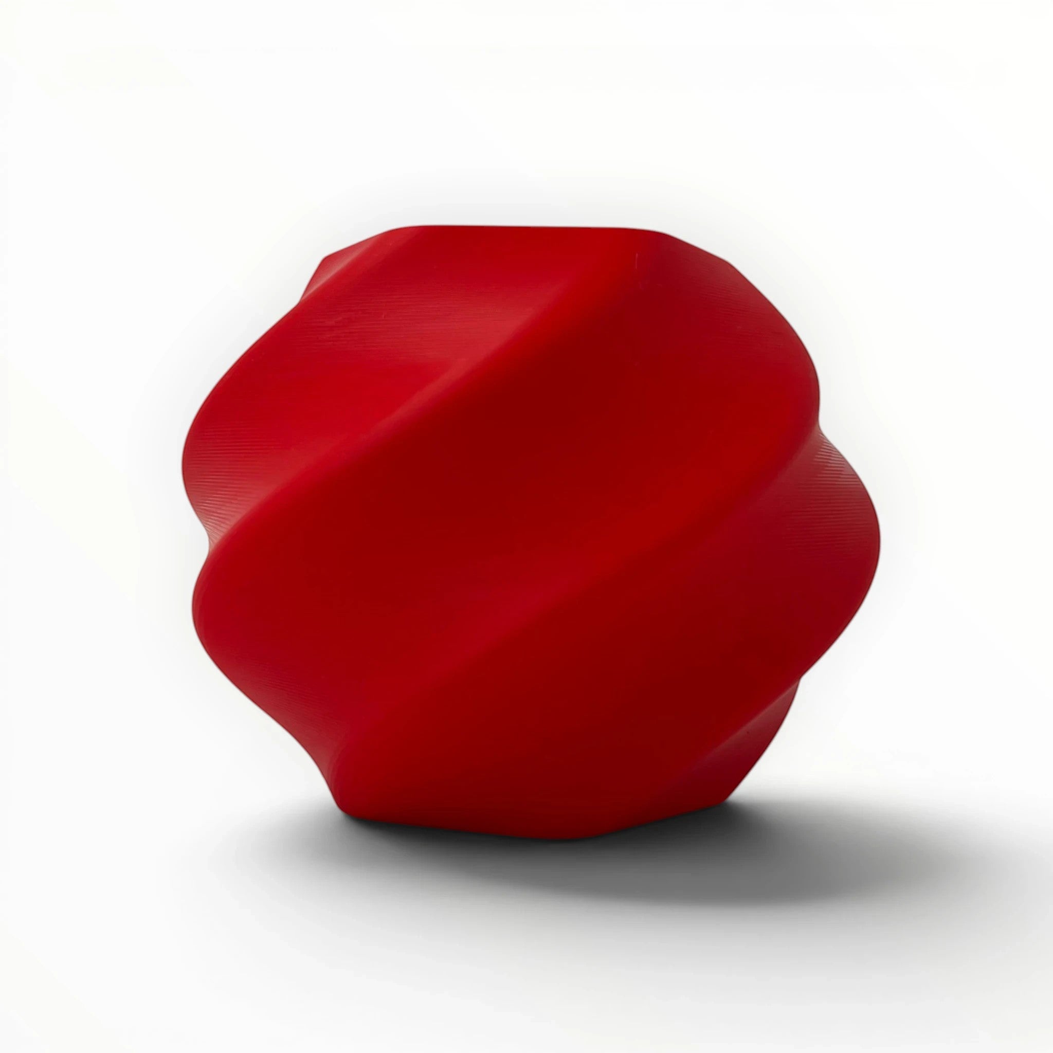 Templast red PLA Pro filament, 1.75mm diameter, with a twisted geometric design. Ideal for 3D printing.